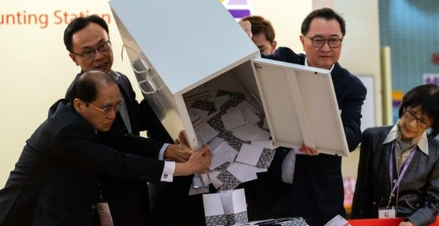 Voters turn out in record numbers to cast ballots in Hong Kong's district council elections