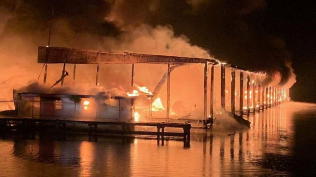 At least 8 people killed as massive fire destroys dozens of boats in a US marina