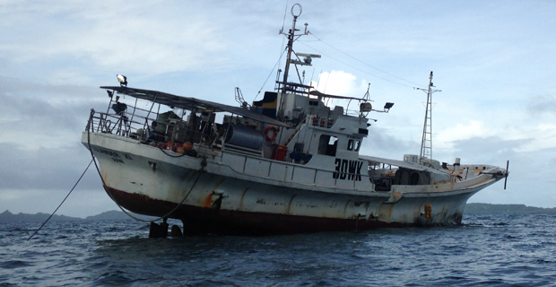 Local fishing vessel runs aground on a reef patch within the bay in Lomaloma