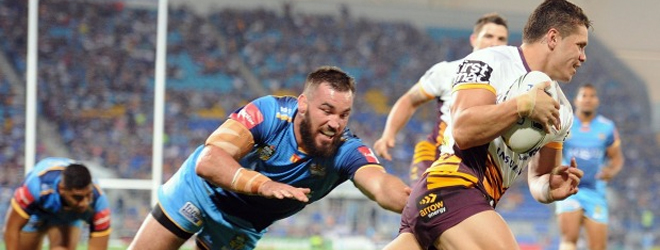 Broncos survive late Titans charge