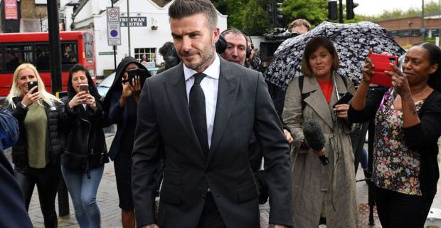 Beckham banned from driving for using mobile phone while driving