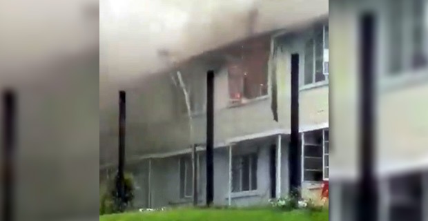 Firefighters trying to control a blaze at Nasova Police Barracks