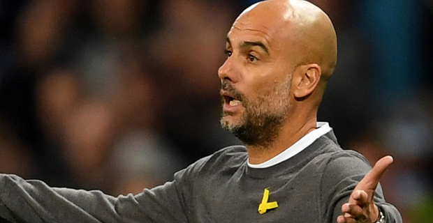 Man City manager charged by Football Association for wearing a political message