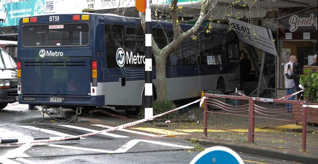 Bus hits pedestrians and slams into store in North Shore shopping area