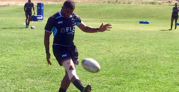 Baber working with Ravouvou, Nasilasila and Nacuqu on kicking game