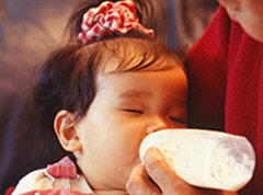 Healthy baby photos on infant milk cans to be removed