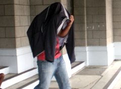 Man charged with 3 counts of rape after allegedly putting up pornographic photos