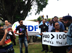 14 in custody for assembling in a public place