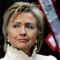 Clinton urges Govt to return to democracy