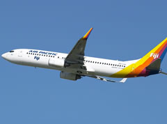 Inaugural HK flight overshadowed by trade dispute