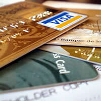 6 charged over alleged credit card scam