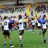 Children cheer for Flying Fijians at training