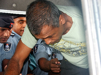 Khan remains in custody