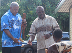 Building destroyed by 2000 coup rebels rebuilt by govt 