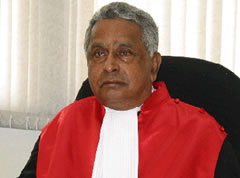 Reddy Helps Convict Rwanda Genocide Mastermind