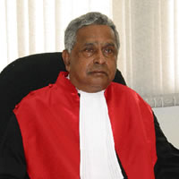 Reddy Helps Convict Rwanda Genocide Mastermind