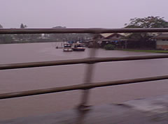 People cross broken bridge in Lautoka