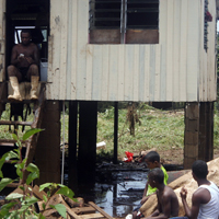 People brave flood waters to save fellow villagers