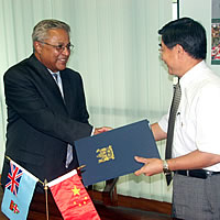 Chaudhry signs aid agreement